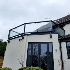 Parapet-Wall Glass Balcony Balustrade for an Irregular Balcony — Norton,